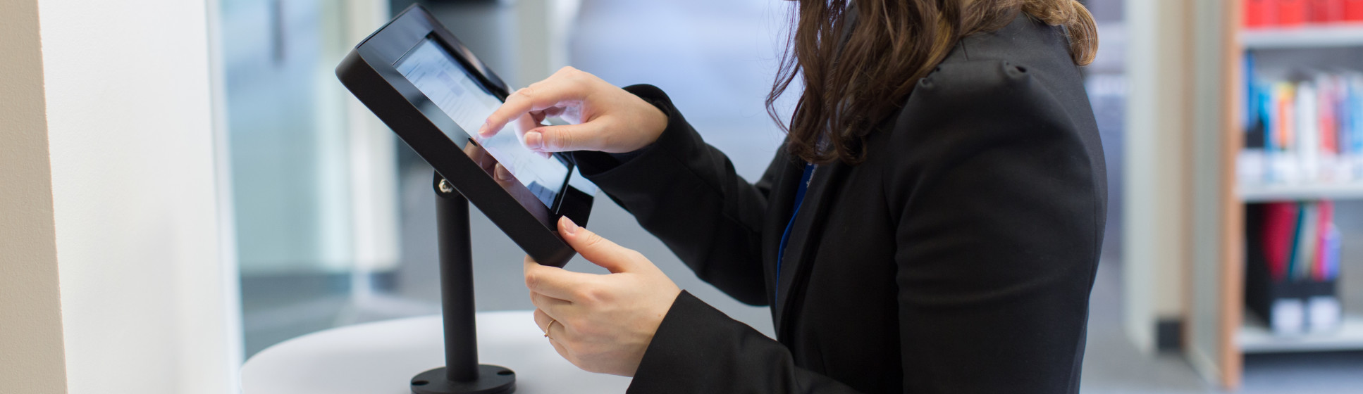 A person using a touch screen.