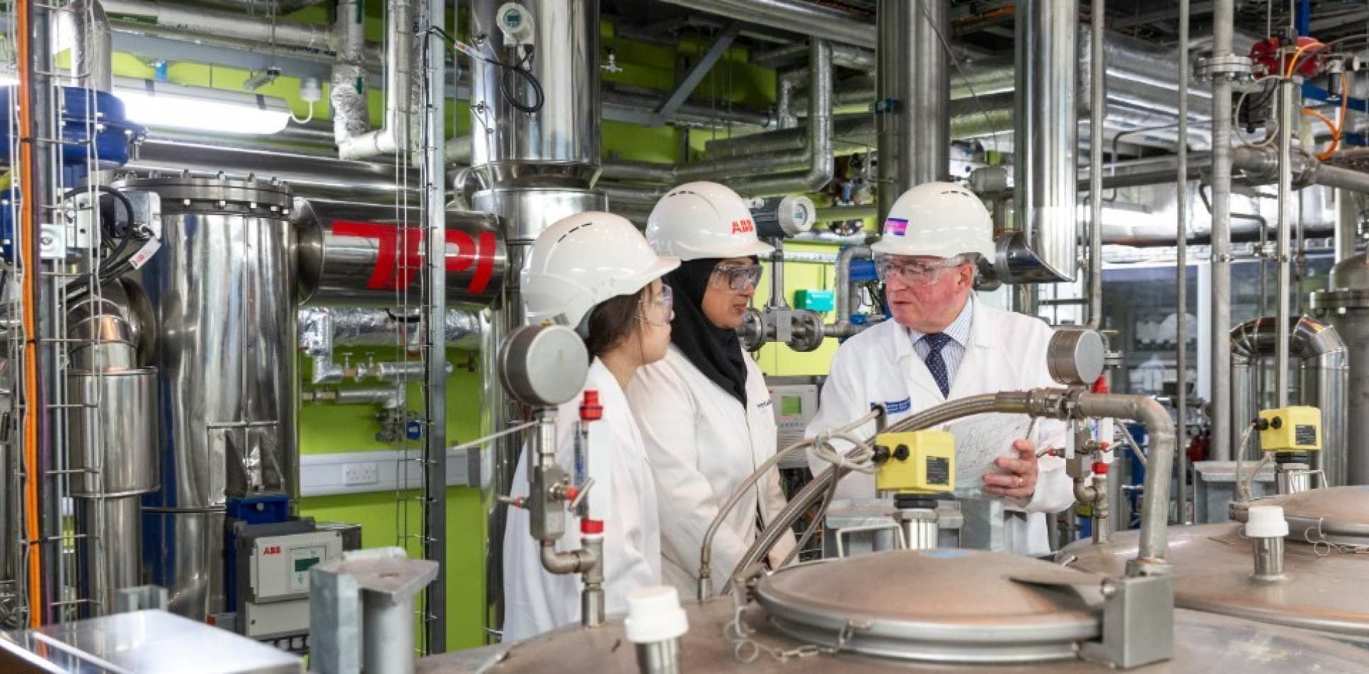 Professor Geoffrey Maitland CBE with team members