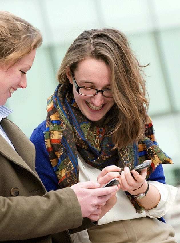 Student smiling with guest