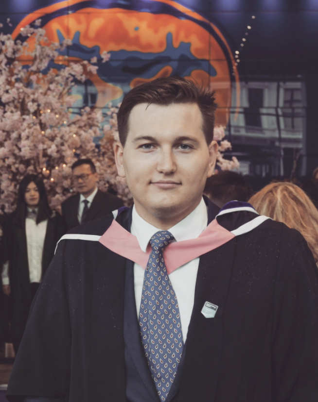 Marc in the main entrance on graduation day