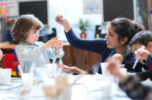 An Imperial researcher engages with a nursery group