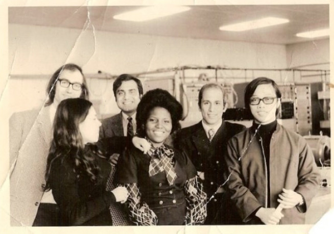 A black and white photo of Yvette Stevens as a young woman with fellow students at Imperial