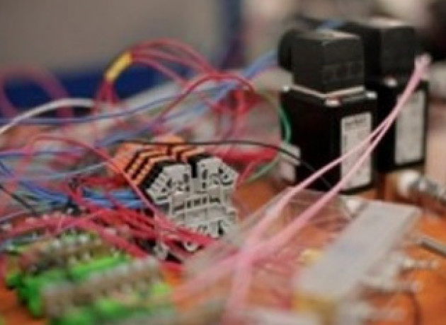 A battery surrounded by wires