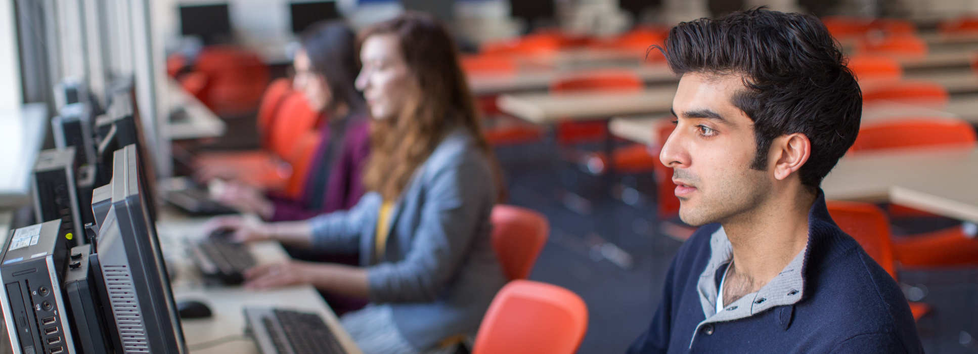 School of Public Health students using a computer