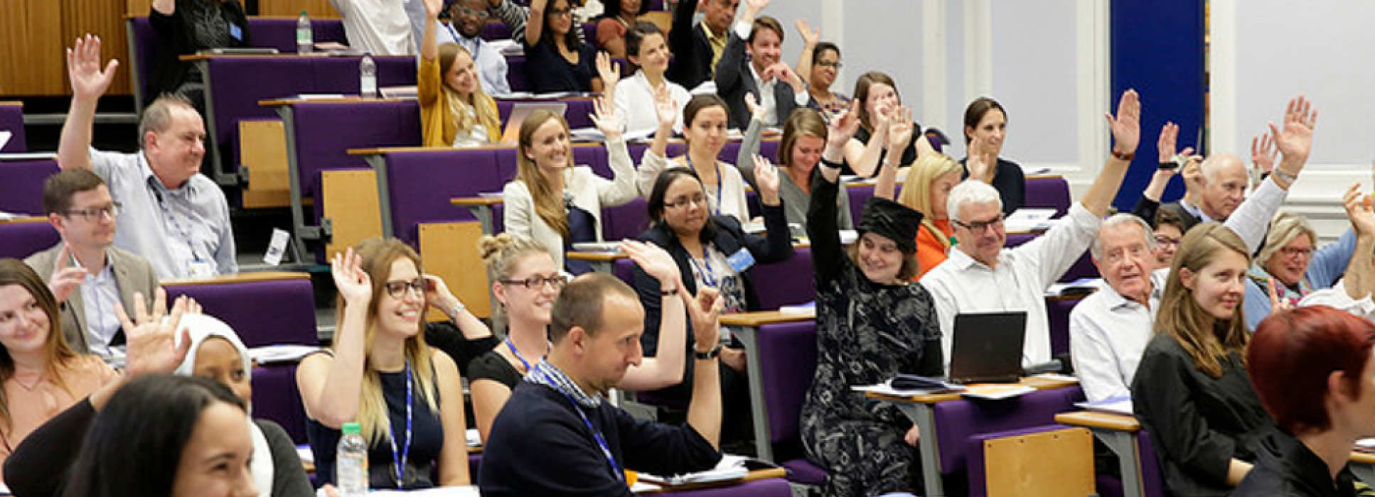 A lecture theatre full of students and staff