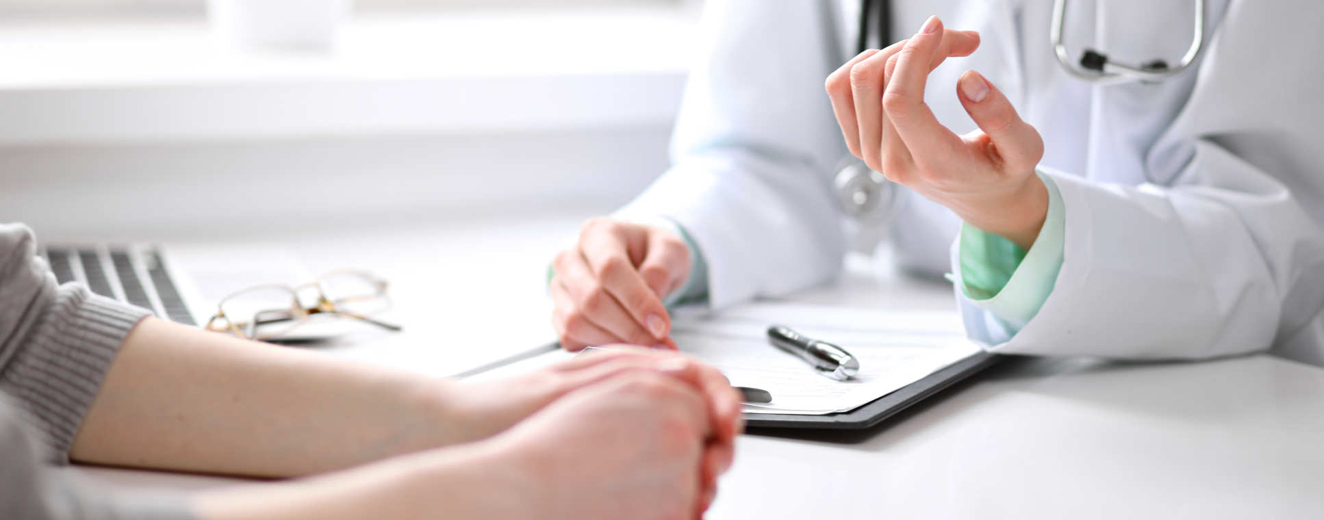 A patient and doctors hands