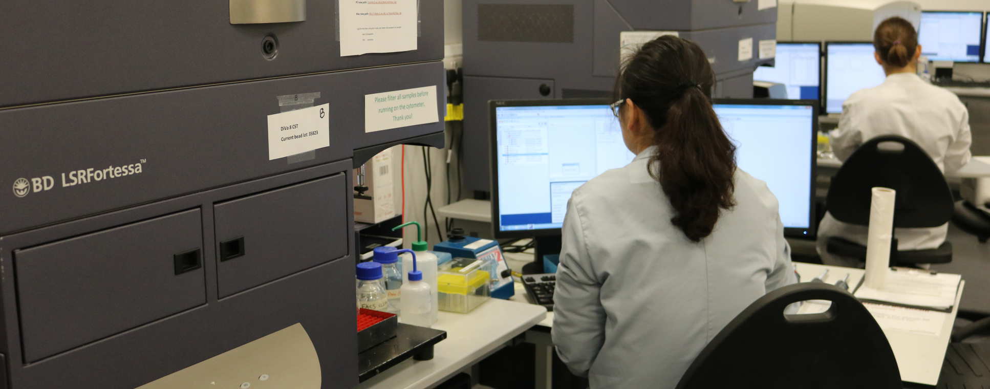 Two female scientists in FACS lab