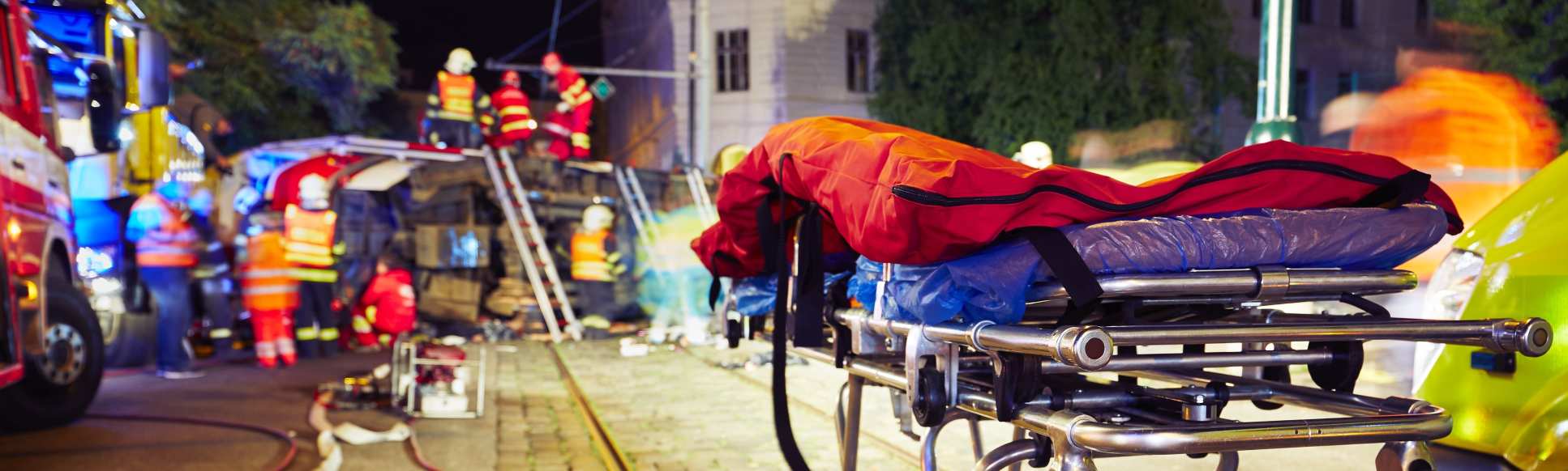 Ambulance at a trauma scene at night