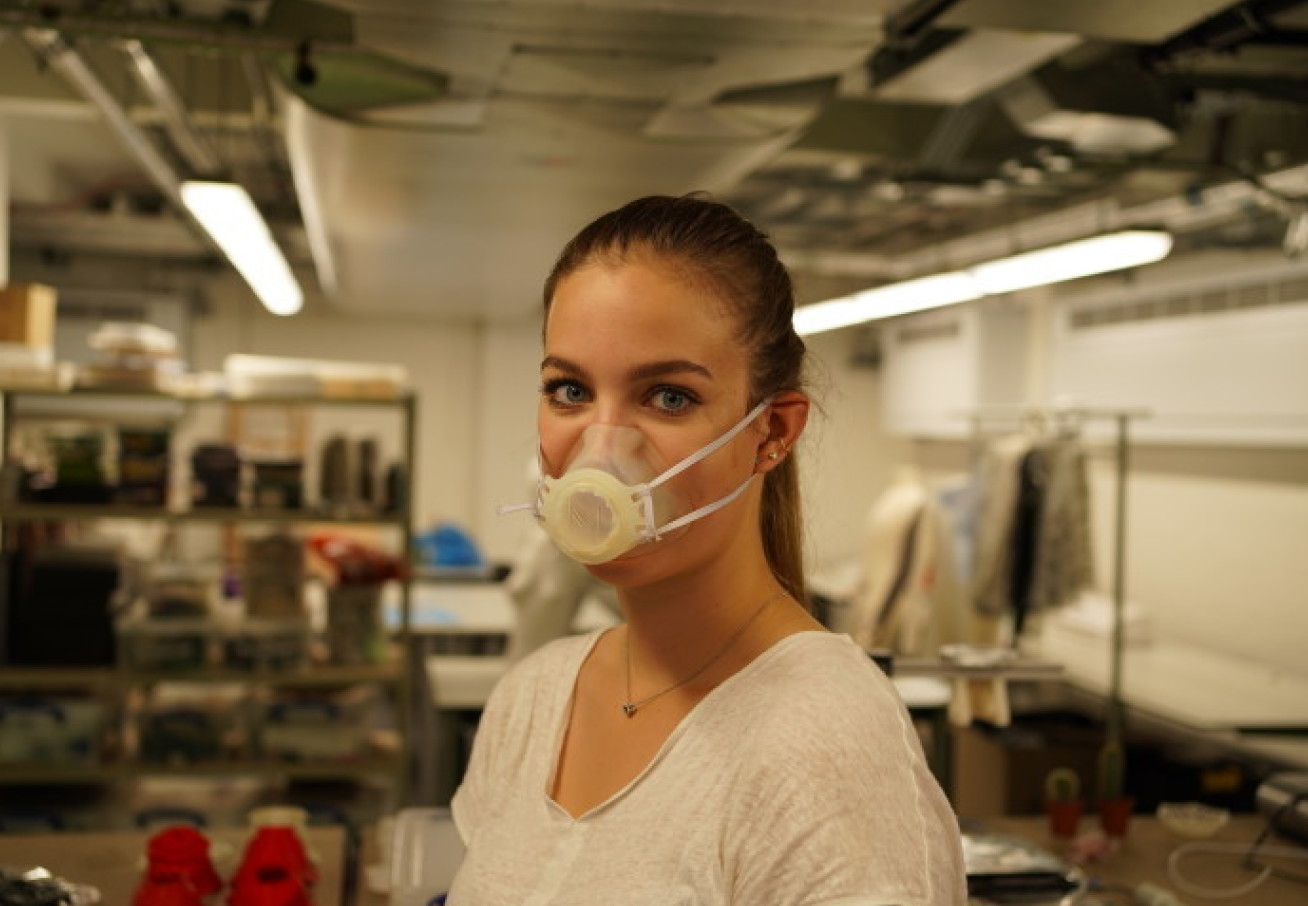 Imperial researcher is shown wearing face mask