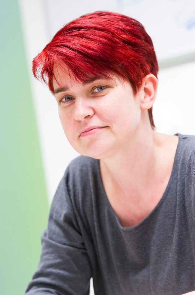 Head-shot of Mary Ryan, a white woman in her early forties with short asymmetric hair 'pixie cut'