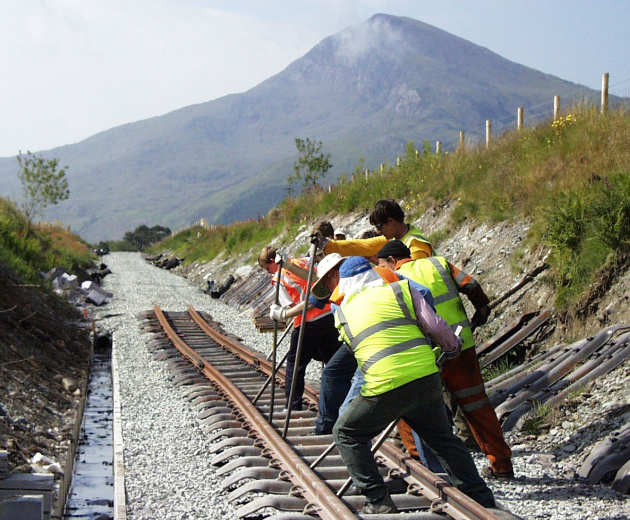 Unfinished railroad towards a mountain