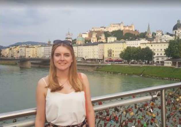 Sarah by a river in Salzburg