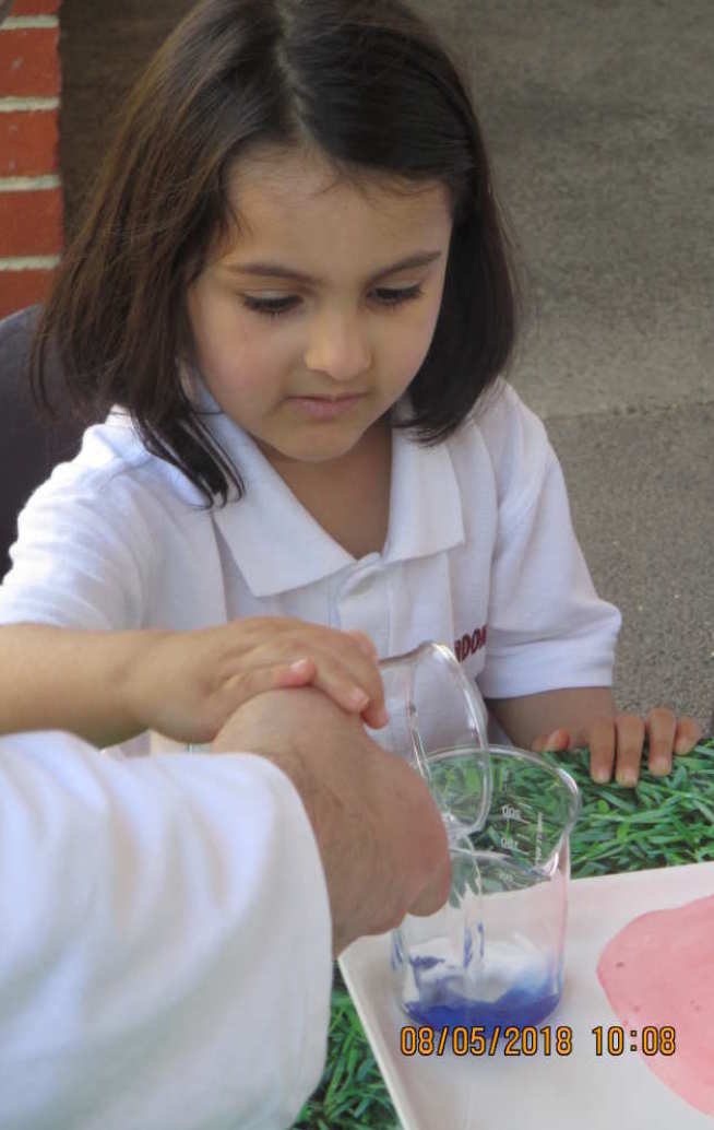 Zeynab Kafizas can be seen here assisting her father with his experiments!