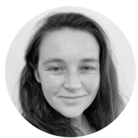 Black and white headshot of woman smiling